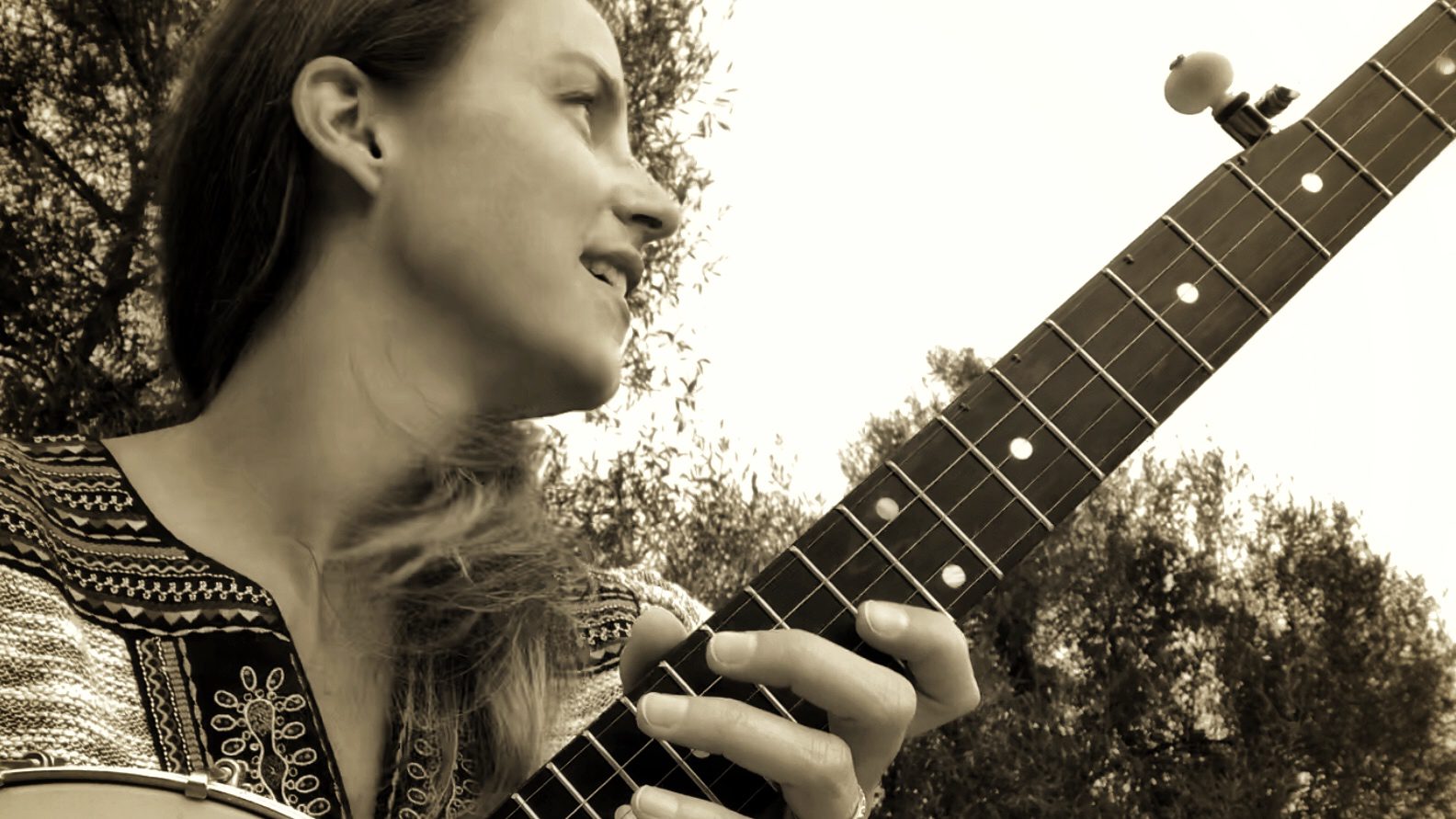 Maggie Pope with guitar